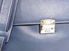 Blue Munari Granata leather briefcase with lock, featuring sturdy handles and sleek design for professional use.