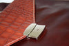 Orna Munari small Vachetta Cocco brown briefcase with sleek leather design and sturdy handle, perfect for professional use.