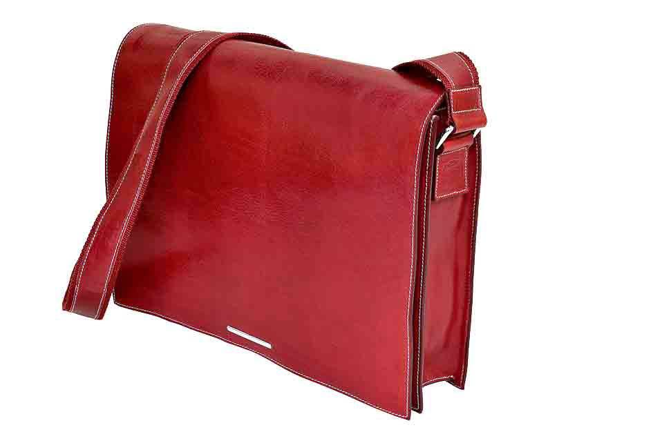 Dark brown Munari Leather Messenger Bag with Vachetta leather accents, featuring adjustable strap and classic design.