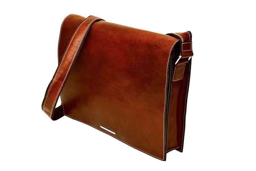Dark brown Munari leather messenger bag with Vachetta leather accents, featuring a classic, structured design and adjustable shoulder strap.