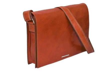 Dark brown Munari leather messenger bag with Vachetta leather accents, featuring a flap closure and adjustable strap.
