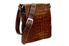 Munari Vachetta Cocco leather shoulder bag with adjustable strap, crafted from smooth, high-quality leather.
