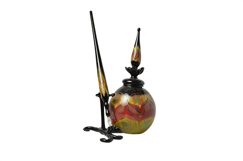 Murano glass inkwell set with green, yellow, and red inkwells showcasing vibrant, handcrafted Murano glass art.