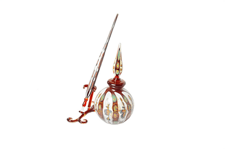 Murano glass inkwell set with green, yellow, and red inkwells showcasing vibrant, handcrafted Murano art glass.