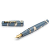 Leonardo Officina Ita Momento Zero Nuvola fountain pen with a glossy blue resin body and gold-plated accents.