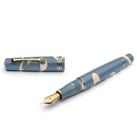 Leonardo Officina Ita Momento Zero Nuvola fountain pen with a glossy blue resin body and gold-plated accents.