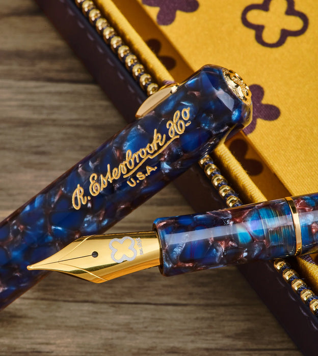 Esterbrook Niblet fountain pen with a sleek nib and smooth black body, showcasing its elegant design and fine writing tip.