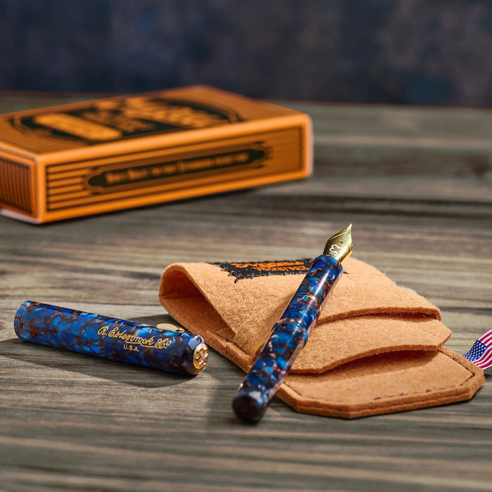 Esterbrook Niblet fountain pen with a sleek design and visible nib, showcasing its compact and stylish writing instrument.