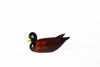 No Solo Vetro glass duck pen rest in purple, featuring a decorative design for holding pens and writing tools.