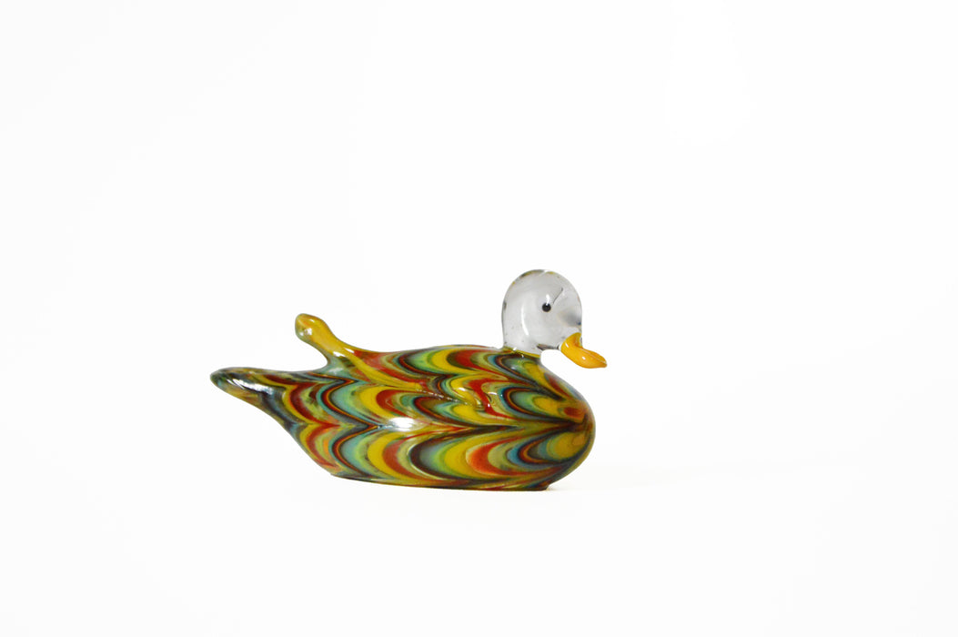 No Solo Vetro glass duck pen rest in purple, decorative and functional desk accessory featuring two glass duck figures.