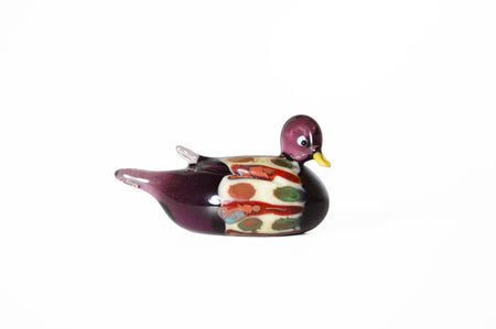 No Solo Vetro glass ducks pen rest in purple, featuring handcrafted glass ducks design for holding pens on a desk.