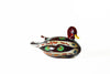 No Solo Vetro glass ducks pen rest in purple, decorative office accessory with colorful duck design on transparent glass.