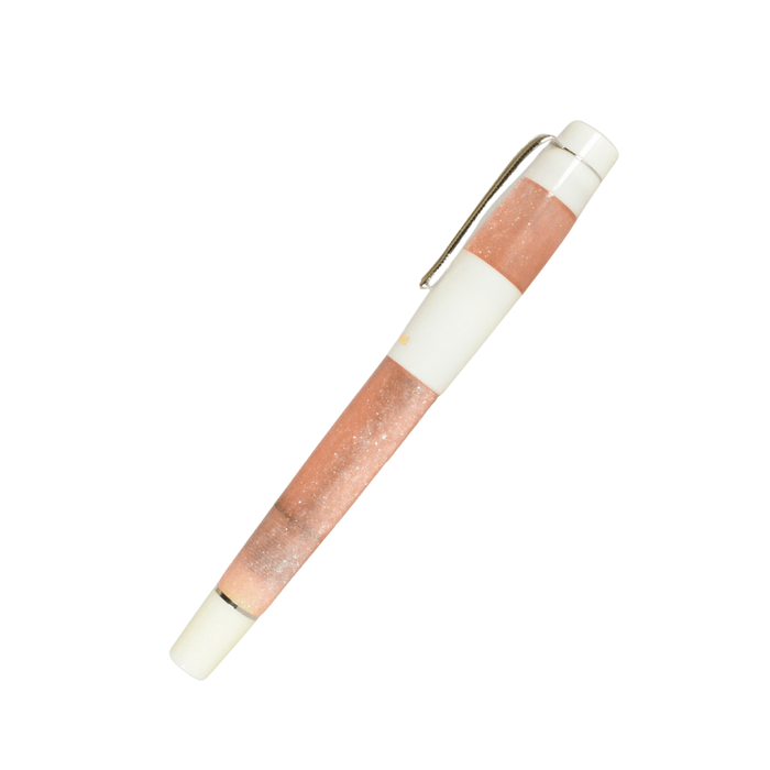 Opus 88 Koloro pink fountain pen with an elegant design and fine nib, showcasing the vibrant color and detailed craftsmanship.