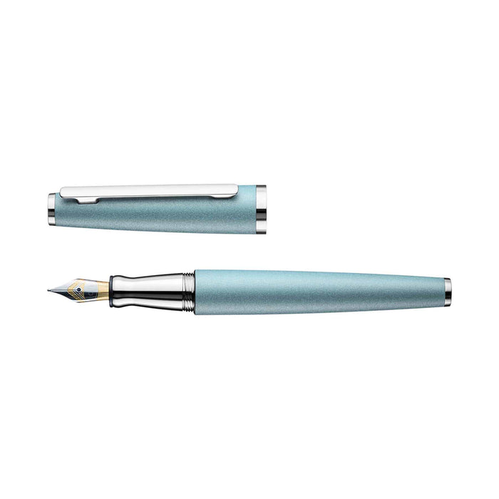 Otto Hutt Design 06 Arctic Blue fountain pen with fine nib, featuring sleek blue resin body and gold accents.