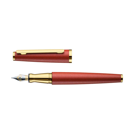 Otto Hutt Design 06 Ruby Red fountain pen with an elegant extra-fine nib, showcasing smooth red lacquer and gold accents.