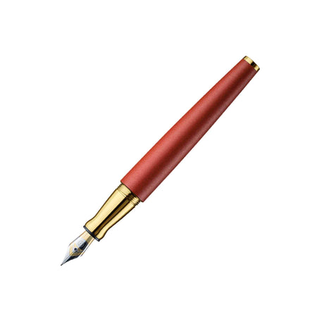 Otto Hutt Design 06 Ruby Red fountain pen with a sleek body and fine nib, showcasing elegant craftsmanship and vibrant red color.