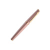 Otto Hutt Design 06 Seashell Pink fountain pen with fine nib, featuring a sleek pink body and elegant design details.