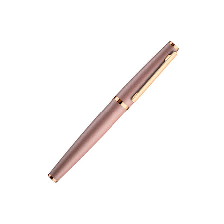 Otto Hutt Design 06 Seashell Pink fountain pen with fine nib, featuring a sleek pink body and elegant design details.