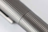 Otto Hutt Design 08 Ruthenium Plated Fountain Pen with fine nib, sleek design, and elegant detailing on a white background.