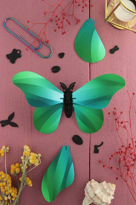 Assembli Paper Giant Silk Butterfly craft made of black paper with detailed wing designs, perfect for creative art projects.