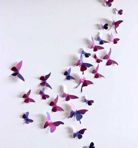 Assembli Paper Butterfly Collection crafts with vibrant Caribbean green paper, perfect for DIY art and decorative projects.