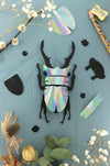 Small Paper Stag Beetle craft by Assembli in Caribbean green metal paper, detailed and realistic insect model for arts and crafts.