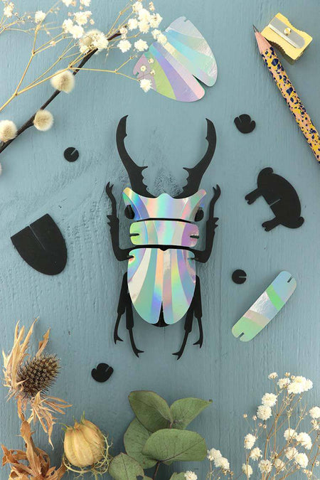 Small Paper Stag Beetle craft by Assembli in Caribbean green metal paper, detailed and realistic insect model for arts and crafts.