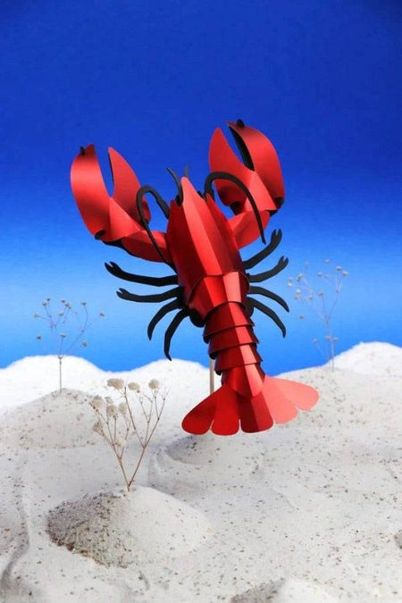 Paper craft lobster from Assembli, featuring detailed red lobster design with textured paper and intricate craftsmanship.