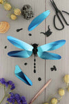 Glossy Caribbean green paper Anisoptera dragonfly craft by Assembli, showcasing detailed paper wings and body.