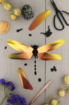 Glossy Caribbean green paper Anisoptera dragonfly craft by Assembli, featuring intricate paper wings and detailed body.