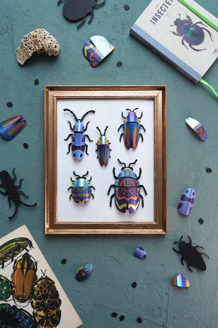 Green blend Paper Beetle Collection by Assembli, featuring colorful paper craft beetles for creative projects.