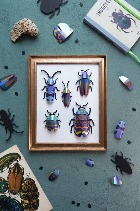 Green blend Paper Beetle Collection by Assembli, featuring colorful paper craft beetles for creative projects.