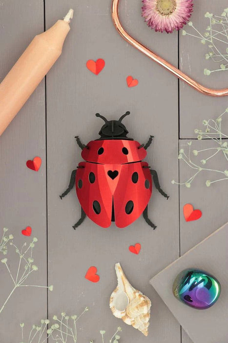 Paper Ladybug and Lovebug craft set by Assembli, featuring colorful paper ladybugs and lovebugs for creative projects.