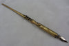 Bronze Papier Plume dipping pen with fleur-de-lys design, ideal for calligraphy and decorative writing.