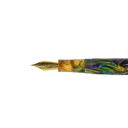 Papier Plume x Hardy Penwrights Krewe of Calliope fountain pen with gold clip and dark ink cap, showcasing elegant craftsmanship.