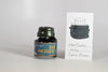 Papier Plume Chicago Pen Show Faceless Lady Shimmer Fountain Pen Ink bottle with colorful label and shimmering ink details.