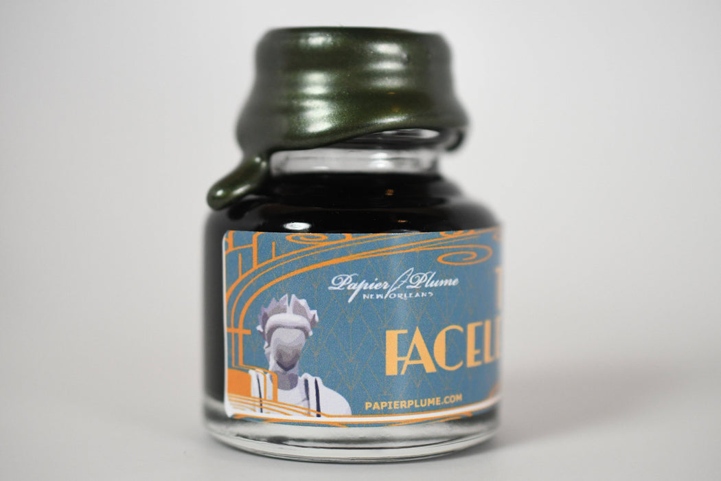 Papier Plume Chicago Pen Show The Faceless Lady shimmer fountain pen ink bottle with elegant label design.
