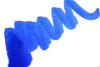 Papier Plume New Orleans Collection fountain pen ink in Calle Real bottle, vibrant ink visible in glass ink bottle.