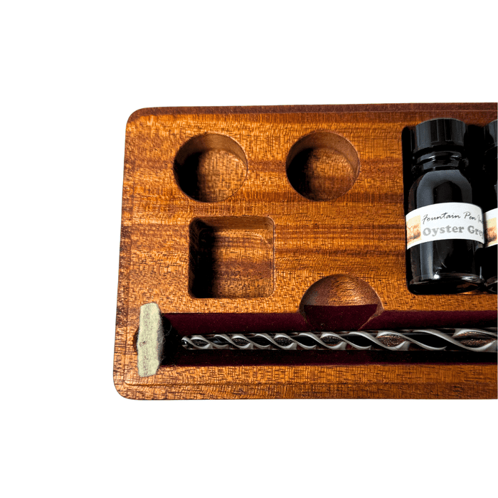 Papier Plume glass pen set with elegant calligraphy pens and matching ink bottles for artistic writing and gifting.
