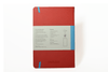Endless Recorder journal with crimson sky cover, blank pages, and spiral binding, ideal for note-taking and writing.
