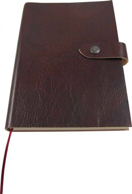 Small soft cover leather journal with button strap from Papier Plume, featuring lined pages for writing and note-taking.