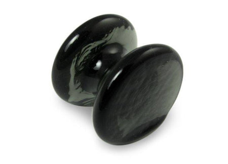 Amber glass pen rest by Papier Plume, elegant and smooth, designed to hold pens securely on a desk or workspace.