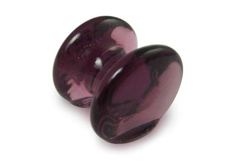 Amber glass pen rest by Papier Plume, elegant and smooth with a curved design for holding pens and writing accessories.