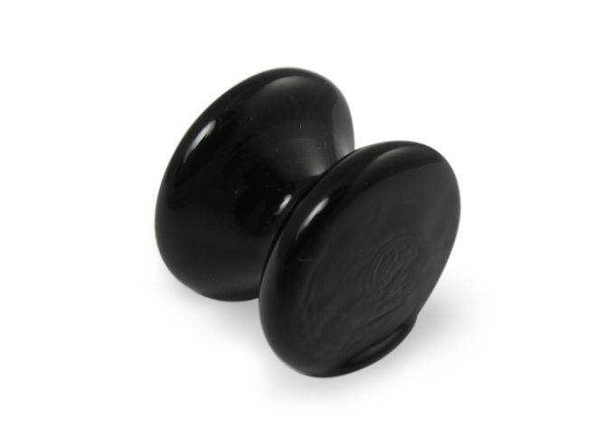 Amber glass pen rest by Papier Plume, elegant and smooth with a sleek design for holding pens on a desk.