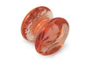 Amber glass pen rest by Papier Plume, elegant and smooth, designed to hold pens and keep writing spaces organized.