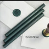 Black pliable sealing wax sticks by Papier Plume, 7 inches long, soft and flexible for sealing and craft projects.