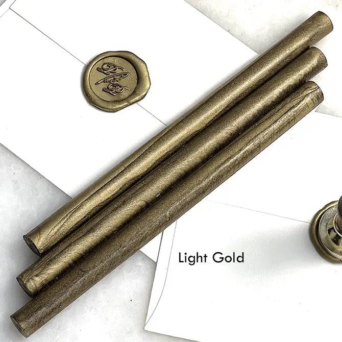 Black pliable sealing wax sticks by Papier Plume, 7 inches long, ideal for sealing and decorative wax applications.