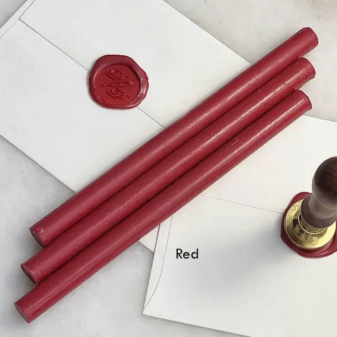 Black pliable sealing wax sticks by Papier Plume, 7 inches long, ideal for sealing and decorative wax applications.