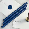 Black pliable sealing wax sticks by Papier Plume, 7 inches long, ideal for sealing and craft projects.