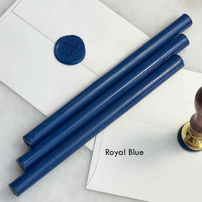 Black pliable sealing wax sticks by Papier Plume, 7 inches long, ideal for sealing and craft projects.